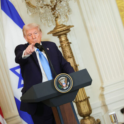 U.S. President Donald Trump takes questions from reporters during a press conference with Israeli Prime Minister Benjamin Netanyahu in the East Room of the White House in Washington, D.C. on February 4, 2025. (Photo by Bryan Dozier / Middle East Images / Middle East Images via AFP) (Photo by BRYAN DOZIER/Middle East Images/AFP via Getty Images)