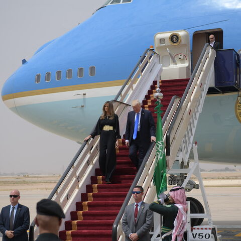 US President Donald Trump and First Lady Melania Trump step off Air Force One upon arrival at King Khalid International Airport in Riyadh on May 20, 2017. (Photo by MANDEL NGAN / AFP) (Photo by MANDEL NGAN/AFP via Getty Images)