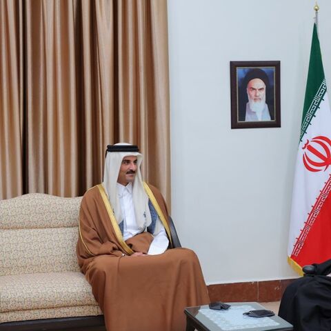 Iranian President Masoud Pezeshkian (L) and Iranian Supreme Leader Ayatollah Ali Khamenei (R) host the Qatari emir, Sheikh Tamim bin Hamad Al Thani, in Tehran, Feb. 19, 2025.