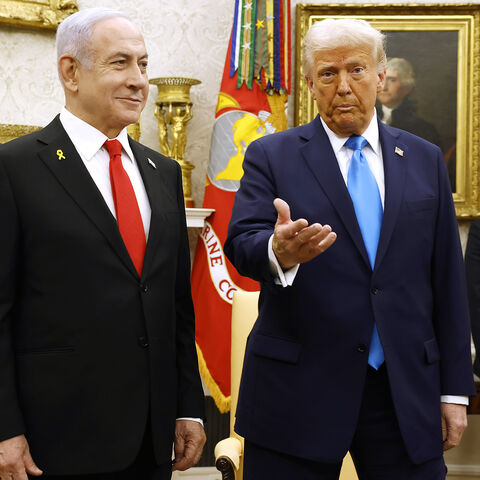 US President Donald Trump, accompanied by Israeli Prime Minister Benjamin Netanyahu (L), speaks during a meeting in the Oval Office of the White House, Washington, Feb. 4, 2025.