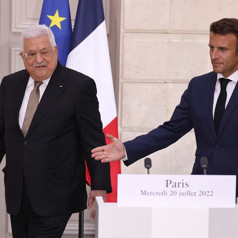 Palestinian President Mahmoud Abbas (L) and French President Emmanuel Macron take part in a joint press conference at the Elysee Presidential Palace in Paris on July 20, 2022. (Photo by Ludovic MARIN / POOL / AFP) (Photo by LUDOVIC MARIN/POOL/AFP via Getty Images)
