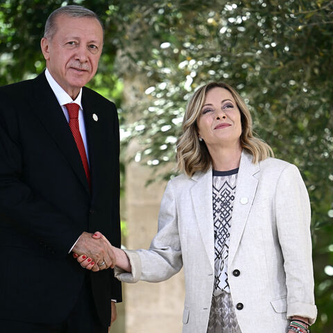 Turkish President Recep Tayyip Erdogan is welcomed by Italy's Prime Minister Giorgia Meloni upon arrival at the Borgo Egnazia resort for the G7 Summit hosted by Italy in Apulia region, on June 14, 2024 in Savelletri.