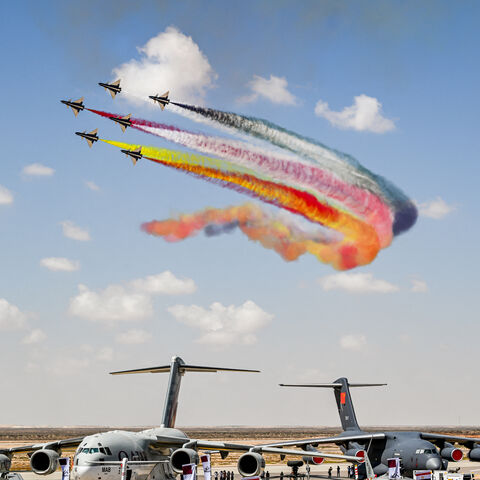 Chengdu J-10 Vigorous Dragon fighter aircraft of China's Ba Yi (August 1st) Aerobatics Team release smoke while performing manoeuvres during the first Egypt International Airshow at Alamein International Airport in Alamein in northern Egypt on September 4, 2024. (Photo by Khaled DESOUKI / AFP) (Photo by KHALED DESOUKI/AFP via Getty Images)