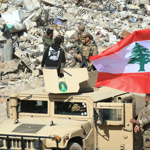 Lebanese army troops patrol the destroyed southern border village of Adaisseh, following the Israeli forces withdrawal on February 18, 2025. Lebanon's army said it deployed in southern border villages and areas vacated by Israeli troops on February 18, as a withdrawal deadline expired under a truce between Israel and Hezbollah. (Photo by Mahmoud ZAYYAT / AFP) (Photo by MAHMOUD ZAYYAT/AFP via Getty Images)