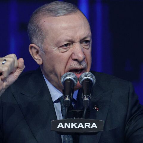 Turkey's President Recep Tayyip Erdogan gestures as he addresses a speech during the Justice and Development Party (AKP), as part of the 8th Ordinary Grand Congress at the Ankara Arena in Ankara, on Feb. 23, 2025.