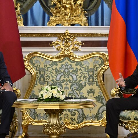 Russian President Vladimir Putin meets with Qatar's Emir Sheikh Tamim bin Hamad al-Thani at the Kremlin in Moscow, on April 17, 2025.