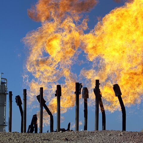 Excess flammable gasses burning from gas flares at the Havana oil field, west of the multi-ethnic northern Iraqi city of Kirku, Oct. 17, 2017.