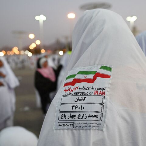 Iranian Muslim pilgrims head to Saudi Arabia's Mount Arafat, also known as Jabal al-Rahma or Mount of Mercy, during the climax of the Hajj pilgrimage, on June 27, 2023.