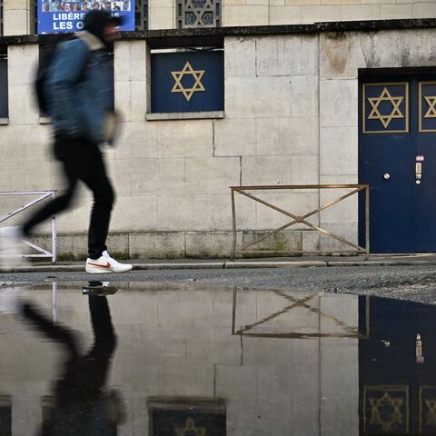 A man walks by the synagogue of Rouen, in northwestern France, on Jan. 7, 2025, following the discovery of an antisemitic graffiti. 