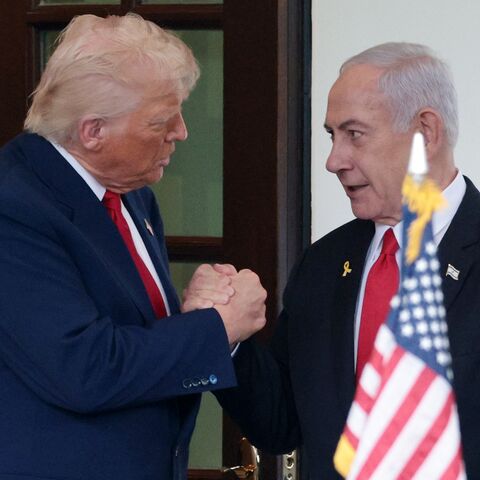 US President Donald Trump (L) bids farewell to Israeli Prime Minister Benjamin Netanyahu as he leaves the White House after a meeting on April 7, 2025, in Washington.
