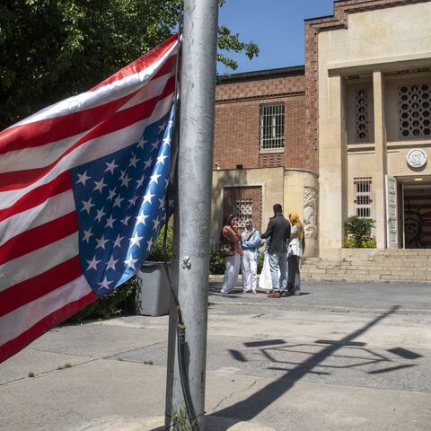 The US flag is seen hung upside down at the former US Embassy in downtown Tehran on April 19, 2025, in Tehran, Iran.