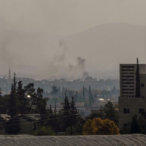 Smoke billows near a military hospital in Harasta, northeast Damascus, following Israeli airstrikes across Syria overnight on May 3, 2025.