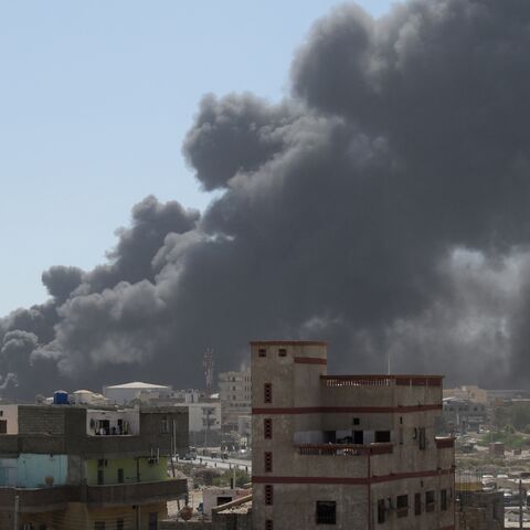 Smoke billows after a drone strike on the port of Port Sudan on May 6, 2025.