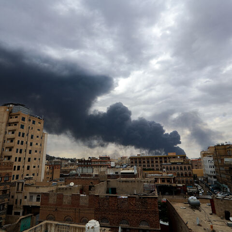 Smoke billows on the horizon following an Israeli air strike on Yemen's Houthi-held capital Sanaa on May 6, 2025.