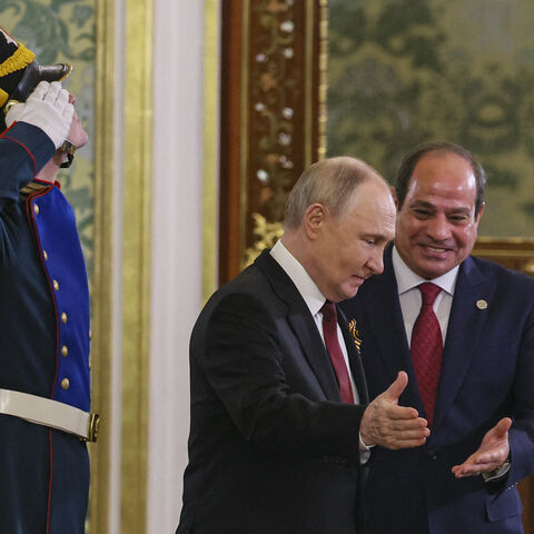 Russian President Vladimir Putin meets with Egyptian President Abdel Fattah El-Sisi at the Kremlin in Moscow on May 9, 2025. (Photo by YURI KOCHETKOV / POOL / AFP) (Photo by YURI KOCHETKOV/POOL/AFP via Getty Images)