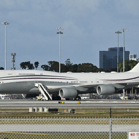 A Qatari Boeing 747 sits on the tarmac of Palm Beach International airport after US President Donald Trump toured the aircraft on Feb. 15, 2025. 
