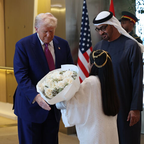 ABU DHABI, UNITED ARAB EMIRATES - MAY 15: U.S. President Donald J. Trump is greeted by UAE President Sheikh Mohamed bin Zayed Al Nahyan upon his arrival on May 15, 2025 in Abu Dhabi, United Arab Emirates. Trump is on the third day of his visit to the Gulf to underscore the strategic partnership between the United States and regional allies including the UAE, focusing on security and economic collaboration. (Photo by Win McNamee/Getty Images)