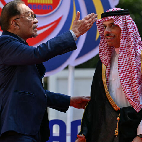 Malaysia's Prime Minister Anwar Ibrahim (L) greets Saudi Arabia's Foreign Minister Prince Faisal bin Farhan al-Saud as he arrives for the 2nd ASEAN-Gulf Cooperation Council (GCC) Summit after the 46th Association of Southeast Asian Nations (ASEAN) Summit in Kuala Lumpur on May 27, 2025. 