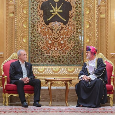 Oman's Sultan Haitham bin Tariq (R) officially welcomes Iranian President Mahmoud Pezeshkian at Muscat's Al Alam Palace, on May 27, 2025.