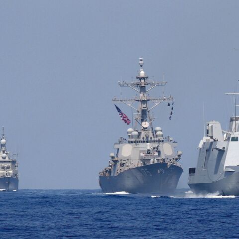 A photo taken on August 7, 2019, shows the French anti-submarine frigate FREMM Auvergne (R) and the US Navy USS Donald Cook class guided missile destroyer (2R) and the Greek HS Aigaion frigate (2L) during an exercise how simulate a humanitarian response to a powerful earthquake and significant movement of IDF vessels and foreign vessels in the Mediterranean sea.