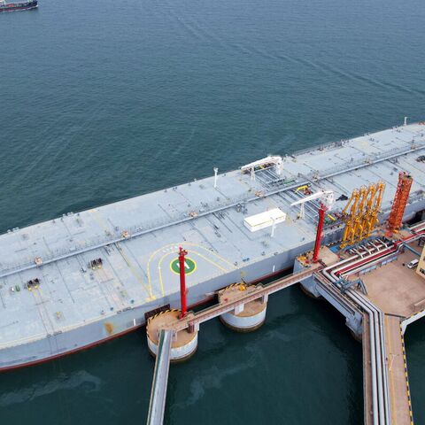 An oil tanker unloads imported crude oil at Qingdao port in China's eastern Shandong province on May 9, 2022.