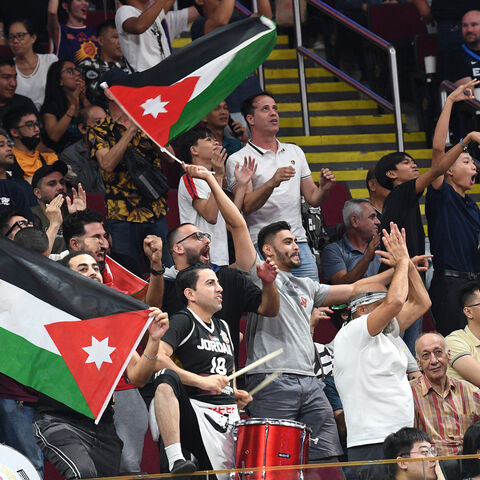 Jordanian fans cheer for their team during the FIBA Basketball World Cup group C match between Jordan and New Zealand at the Mall of Asia Arena in Pasay City, suburban Manila on August 28, 2023. (Photo by Ted ALJIBE / AFP) (Photo by TED ALJIBE/AFP via Getty Images)