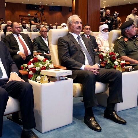 Libyan military strongman Khalifa Hifter (2nd L)