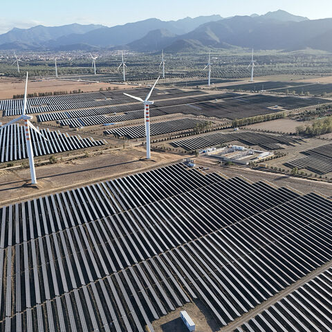 Wind turbines and solar pannels are seen on a campus near Cagliari on the island of Sardinia, Oct. 2, 2024.