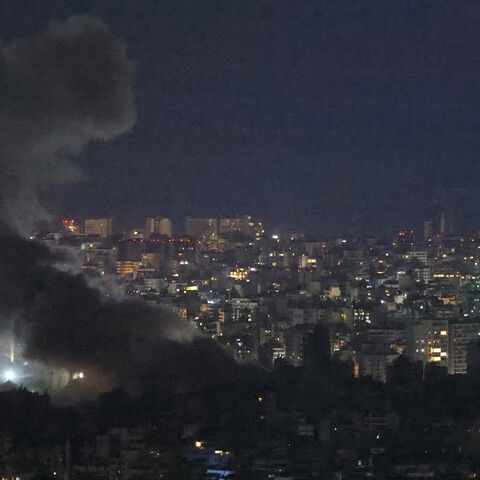 Smoke rises from the site of an Israeli air strike targeting the southern suburbs of Beirut, Nov. 23, 2024. 