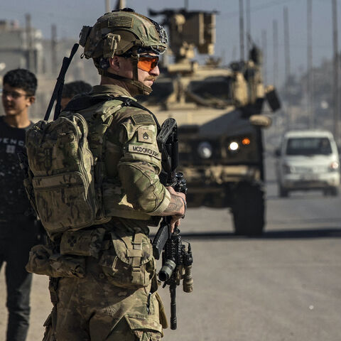 A US soldier keeps watch during a patrol in Syria's northeastern city Qamishli, in the Hasakeh province, mostly controlled by Kurdish-led Syrian Democratic Forces (SDF), on Jan. 9, 2025.
