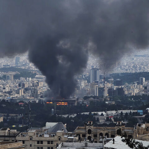 Smoke rises after a reported Israeli strike on a building used by Islamic Republic of Iran News Network, part of Iran's state TV broadcaster, Tehran, Iran, June 16, 2025.