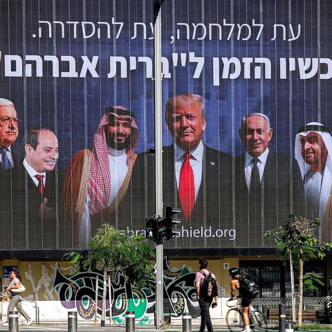 A billboard by the Coalition for Regional Security, with the Hebrew slogan which reads "A time for war, a time for settlement; now is the time for the 'Abrahamic Covenant,'" is displayed in Tel Aviv on June 26, 2025.
