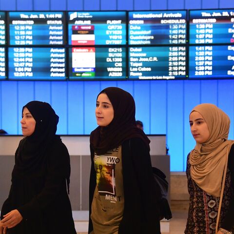Travelers from the Middle East arrive at the International Arrivals section at Los Angeles International Airport on June 29, 2017.