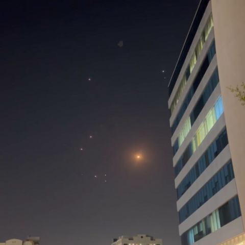 In this frame grab taken from a video, missiles and air-defense interceptors illuminate the night sky over Doha after Iran launched an attack on US forces at Al Udeid Air Base on June 23, 2025, in Doha, Qatar.