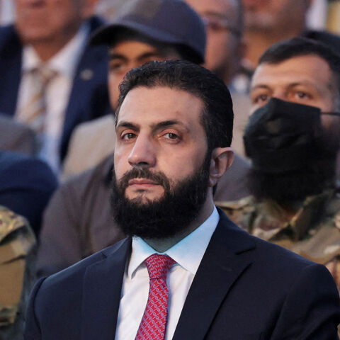 FILE PHOTO: Syria’s interim President Ahmed al-Sharaa looks on as he attends the “Aleppo, Key to Victory” celebration marking Syria’s liberation, in Aleppo, Syria May 27, 2025. REUTERS/Khalil Ashawi/File Photo