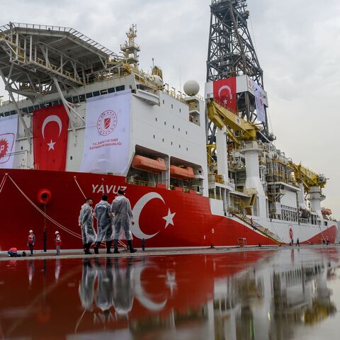 Turkish police officers patrols next to the drilling ship 'Yavuz'