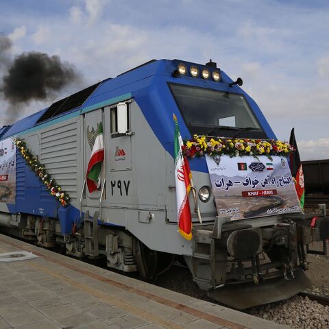 A train moves during the inauguration of a 140-kilometer line running from eastern Iran into western Afghanistan, at a railroad station in Khaf, on Dec. 10, 2020.