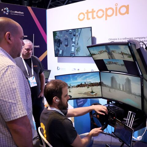 People visit the "EcoMotion Week" trade show on May 11, 2022, in the Israeli coastal city of Tel Aviv.