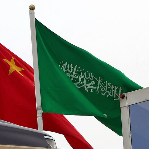 A picture taken on December 7, 2022 in Riyadh, shows the Chinese and the Saudi flags adorning a street ahead of the Chinese president's visit to the Saudi capital. - Chinese President Xi Jinping will make a three-day visit to Saudi Arabia this week, meeting the king and de facto ruler of the world's biggest oil exporter. (Photo by Fayez Nureldine / AFP) (Photo by FAYEZ NURELDINE/AFP via Getty Images)
