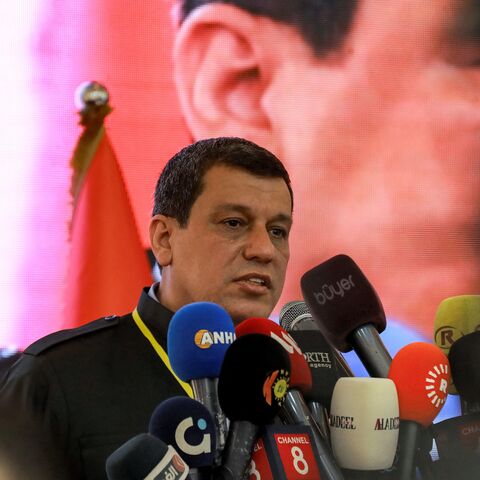 Mazlum Kobane, commander-in-chief of the Syrian Democratic Forces (SDF), speaks during the pan-Kurdish "Unity and Consensus" conference in Qamishli in northeastern Syria, on April 26, 2025. 