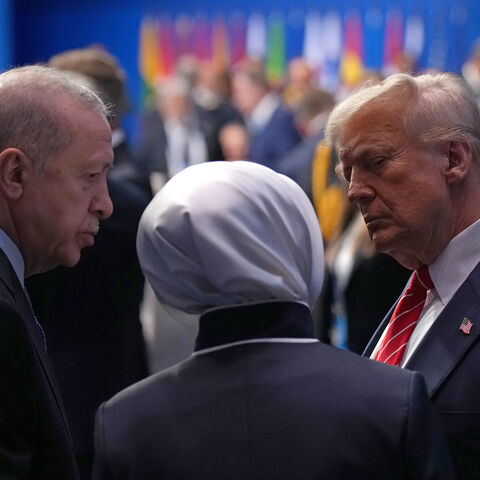 THE HAGUE, NETHERLANDS - JUNE 25: U.S. President Donald Trump (R) speaks with President of the Republic of Türkiye, Recep Tayyip Erdogan (L), as they arrive for the North Atlantic Council Plenary Session on the second day of the 2025 NATO Summit on June 25, 2025 in The Hague, Netherlands. Among other matters, members are to approve a new defense investment plan that raises the target for defense spending to 5% of GDP. (Photo by Andrew Harnik/Getty Images)