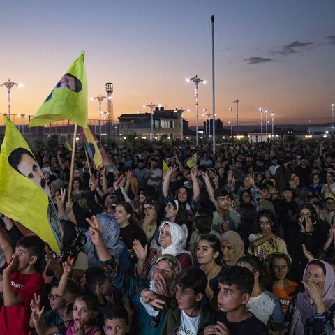 Supporters attend a rally airing a televised statement by the jailed leader and founder of Turkey's Kurdistan Workers Party (PKK), Abdullah Ocalan, in Syria's predominantly Kurdish northeastern city of Qamishli on July 9, 2025.