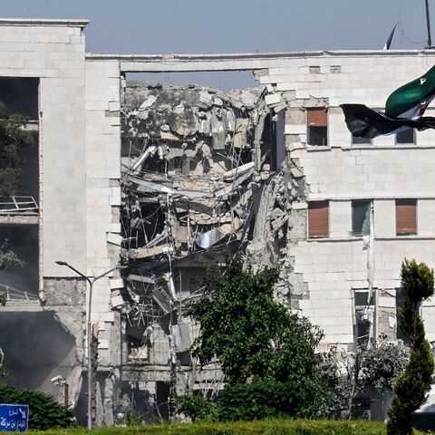 A picture shows a view of the damage following Israeli strikes on the Syrian army and Defense Ministry headquarters in Damascus, on July 16, 2025.