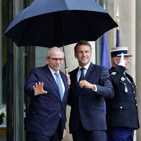 TOPSHOT - France's President Emmanuel Macron (2nd-R) and Lebanon's Prime Minister Nawaf Salam (2nd-L) pose ahead of their working lunch at the presidential Elysee Palace in Paris, on July 24, 2025. (Photo by GEOFFROY VAN DER HASSELT / AFP) (Photo by GEOFFROY VAN DER HASSELT/AFP via Getty Images)