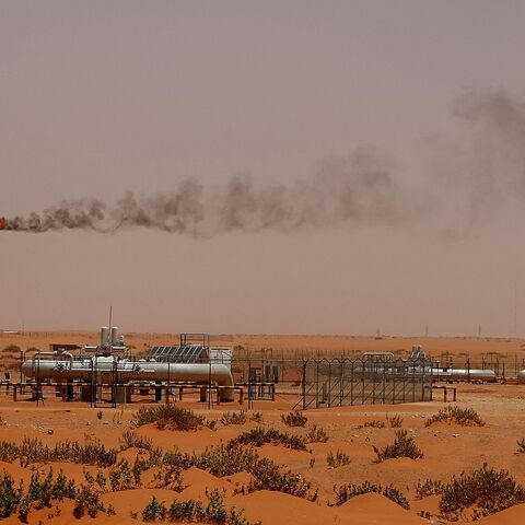 A flame from a Saudi Aramco oil instillation known as "Pump 3" is seen in the desert near the oil-rich area of Khouris, 160 kilometers east of the Saudi capital Riyadh, on June 23, 2008.