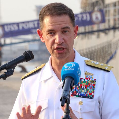 Vice Adm. Brad Cooper Commander of the US Naval Forces Central Command speaks during a press conference in front of the USS Port Royal (CG 73) Guided-missile cruiser at al-Shuaiba port, 35km South of Kuwait City on June 6, 2022. 