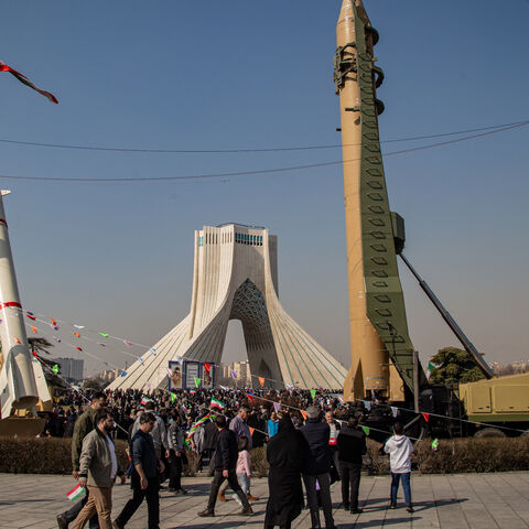 Missiles and UAV's are showed for the people on the side of the road in Tehran, Iran, on Feb. 11, 2024. 