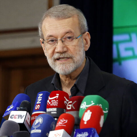 Former Iranian parliament speaker Ali Larijani addresses the media following his registration at the elections registration office in Tehran, on May 31, 2024, ahead of the country's election of a new president next month. 