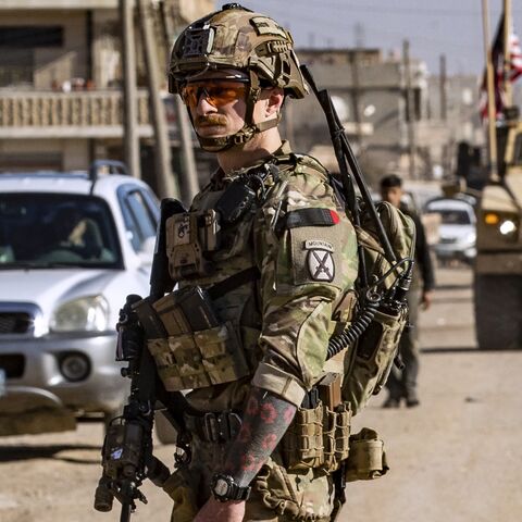 US soldiers patrol in Syria's northeastern city Qamishli, in the Hasakah province, mostly controlled by Kurdish-led Syrian Democratic Forces, on Jan. 9, 2025. 