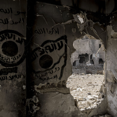 A grafitti on a wall in Tadamon that depicts the flag of the ISIS. Tadamon, Syria, on Feb. 7, 2025. 